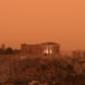 Athens sky turns orange with dust clouds from Africa – video