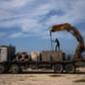 US troops begin construction of Gaza aid pier as questions remain over distribution