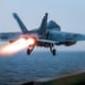 US fighter jet rolls off aircraft carrier as ship reportedly swerves Houthi fire