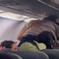 WATCH:  Fight on Frontier Airlines plane caught on camera