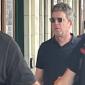 Noel Gallagher arrives for Oasis gig by train