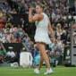 Wimbledon: No. 1 Aryna Sabalenka holds off home favorite Emma Raducanu at Centre Court