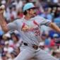 Busch hits 3 homers and Cubs set club record with 8 in 11-3 rout of Cardinals