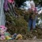 Searchers in helicopters and on horseback scour Texas flood debris for the missing