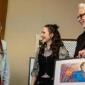 Girl designs Superman film age classification card