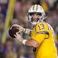 Argument over 'valid business purpose' for NIL collectives threatens college sports settlement