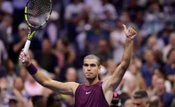 ‌Still sporting his accidental buzz cut, Carlos Alcaraz wins easily at the US Open