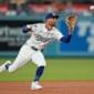 Phillies clinch NL East title in wild 10th-inning comeback against Dodgers