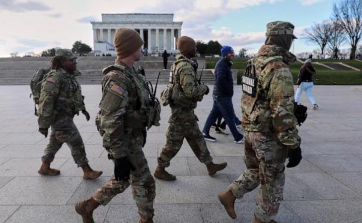 US halts all asylum decisions as suspect in shooting of National Guard members faces murder charge