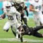 Achane rushes for 134 yards and a TD to help Dolphins edge Saints 21-17 for 3rd straight win