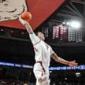 Brazile scores career-best 26 points to lead No. 14 Arkansas to 108-80 win over Queens
