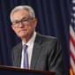 Federal Reserve holds interest rates as Trump piles on pressure